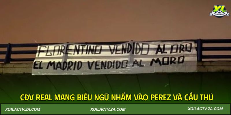 CĐV Real mang biểu ngữ nhắm vào Perez và cầu thủ